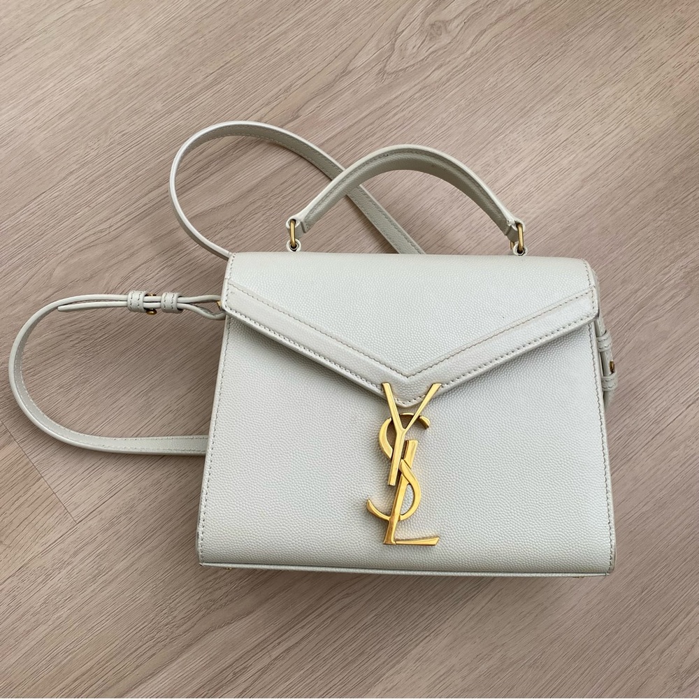 Saint Laurent Cassandra Mini Top Handle Crossbody Bag in Grained Leather…